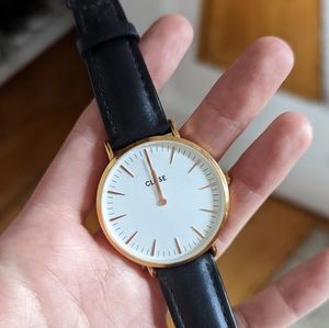Cluse gold and black leather watch